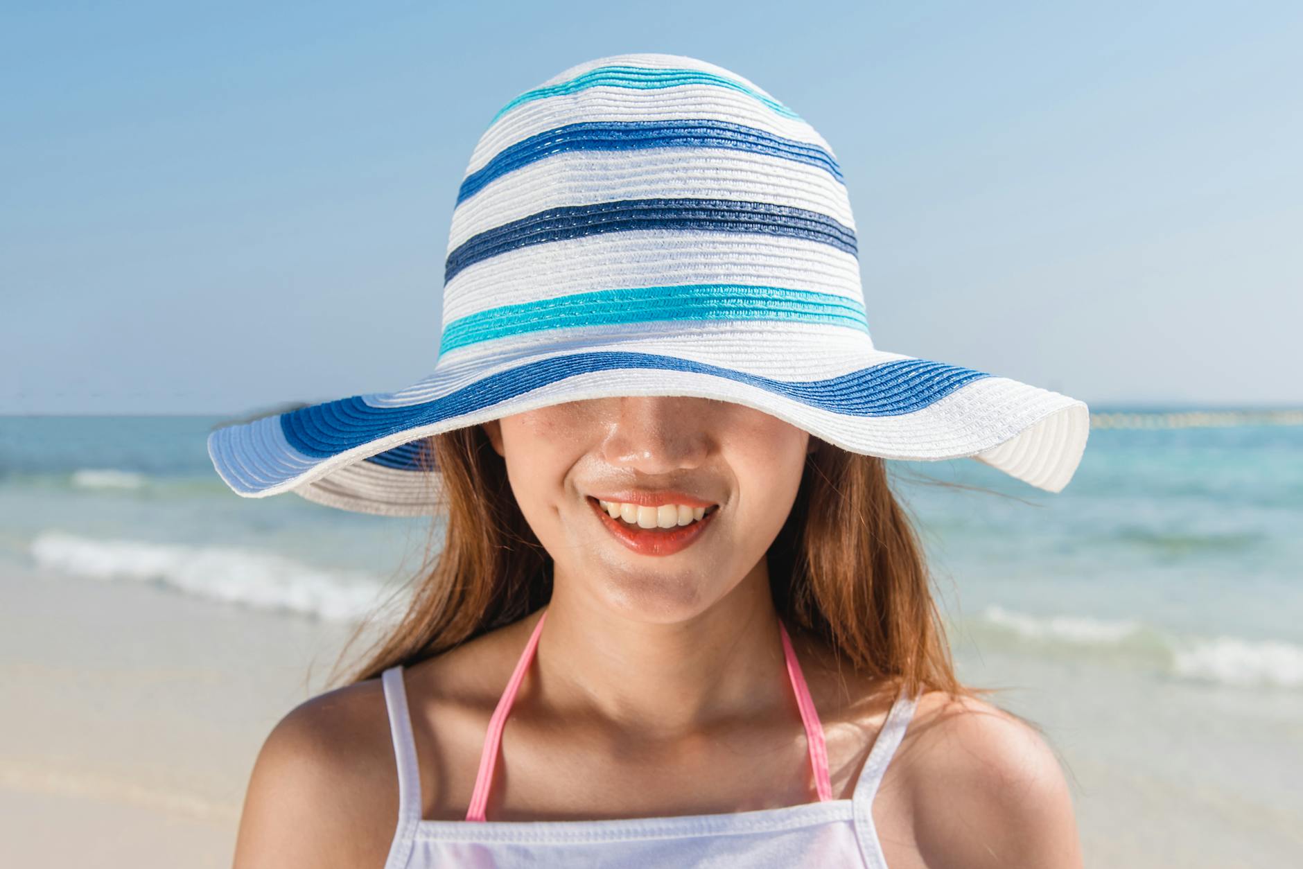 woman wearing sun hat